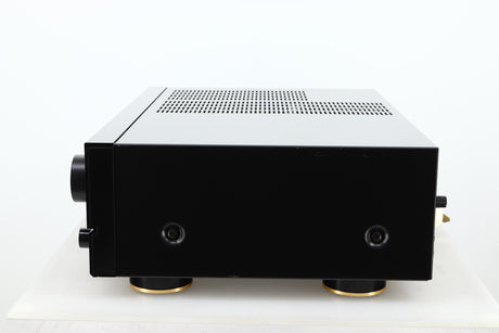 Side view of a used Denon PMA-720 Integrated Amplifier in Black finish 