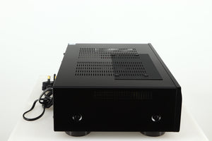 Left side view of a used Denon PMA600 Integrated Amplifier in a black finish