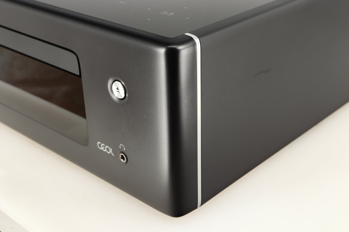 Front right corner of a used Denon RCD-N10 Network CD Receiver in a black finish