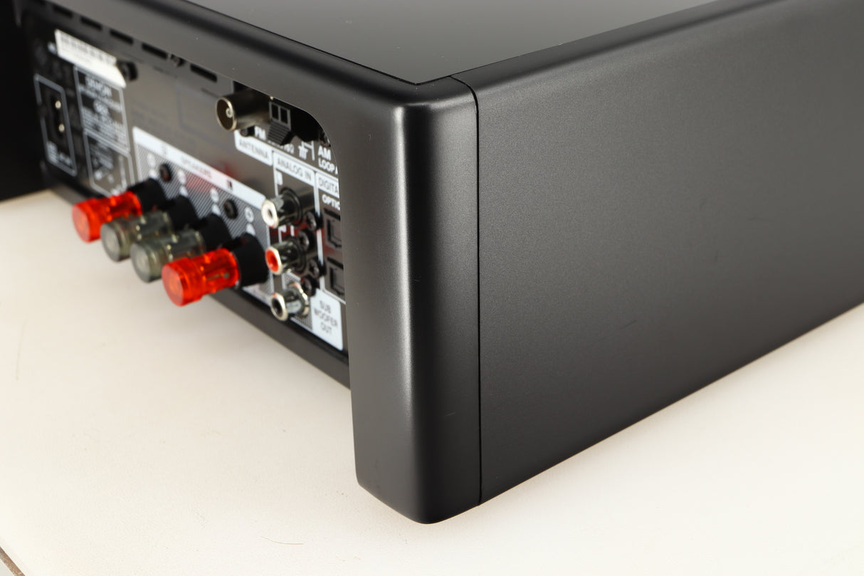 Rear left corner of a used Denon RCD-N10 Network CD Receiver in a black finish