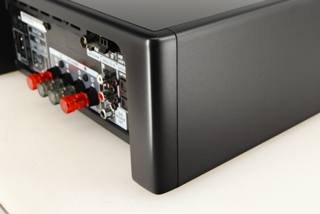 Rear left corner of a used Denon RCD-N10 Network CD Receiver in a black finish