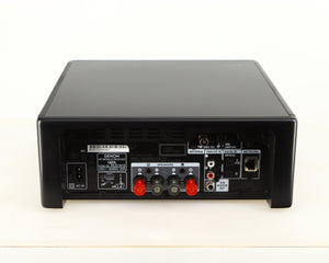 Rear view of a used Denon RCD-N10 Network CD Receiver in a black finish showing Network Input, Power Input, Phono Inputs, Phono Output and Optical Inputs