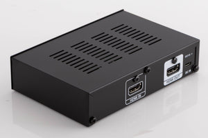 Rear right corner of a used Denon SPK618 HDMI Adaptor in a Black finish