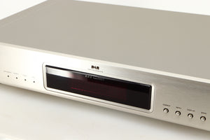 Close up of a used Denon TU-1800 DAB/FM Tuner in a silver finish showing some of the fascia