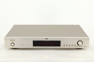 Front view of a used Denon TU-1800 DAB/FM Tuner in a silver finish 