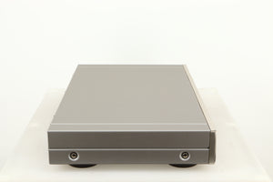 Left side view of a used Denon TU-1800 DAB/FM Tuner in a silver finish 
