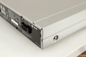 Rear left corner of a used Denon TU-1800 DAB/FM Tuner in a silver finish 