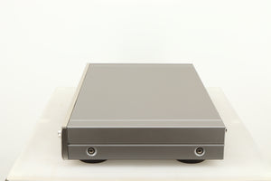 Right side view of a used Denon TU-1800 DAB/FM Tuner in a silver finish 