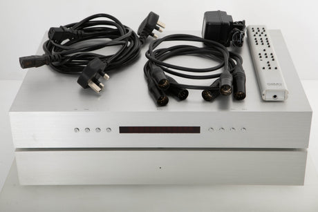 Front view of a Densen 275 Pre Amplifier with 2NRG PSU, Mains cables, 3x XLR cables, and remote PSU