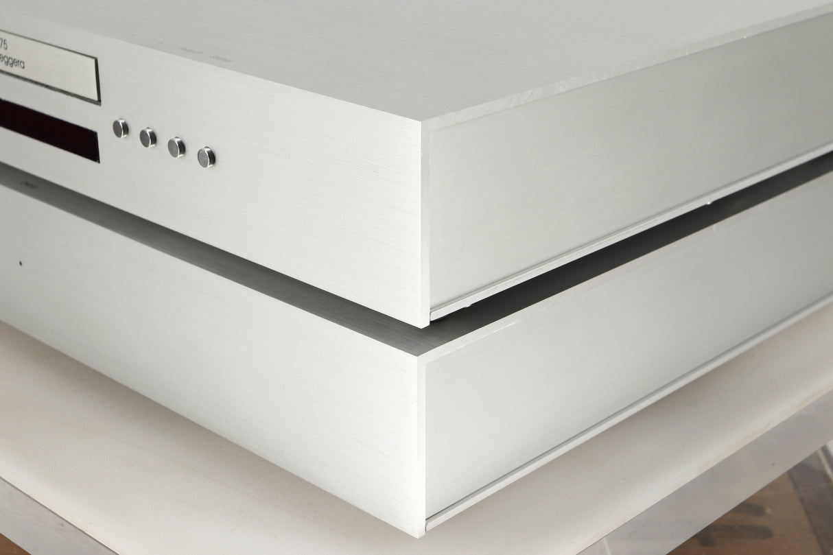 Front right corner view of a used Densen B-475 CD Player and a 2NRG PSU in Albino finish