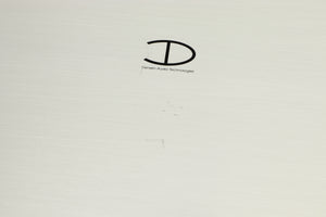 Close up of a used Densen B350Plus Monoblock Power Amplifier in a silver finish showing scratches on top