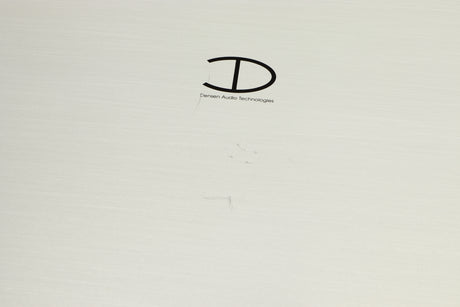 Close up of a used Densen B350Plus Monoblock Power Amplifier in a silver finish showing scratches on top