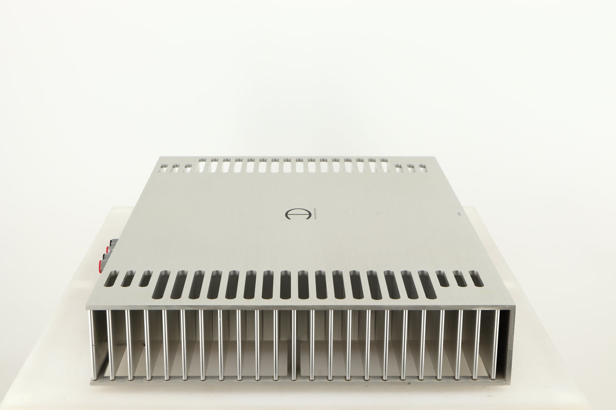 Left side view of a used Densen B350Plus Monoblock Power Amplifier in a silver finish