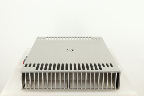 Left side view of a used Densen B350Plus Monoblock Power Amplifier in a silver finish