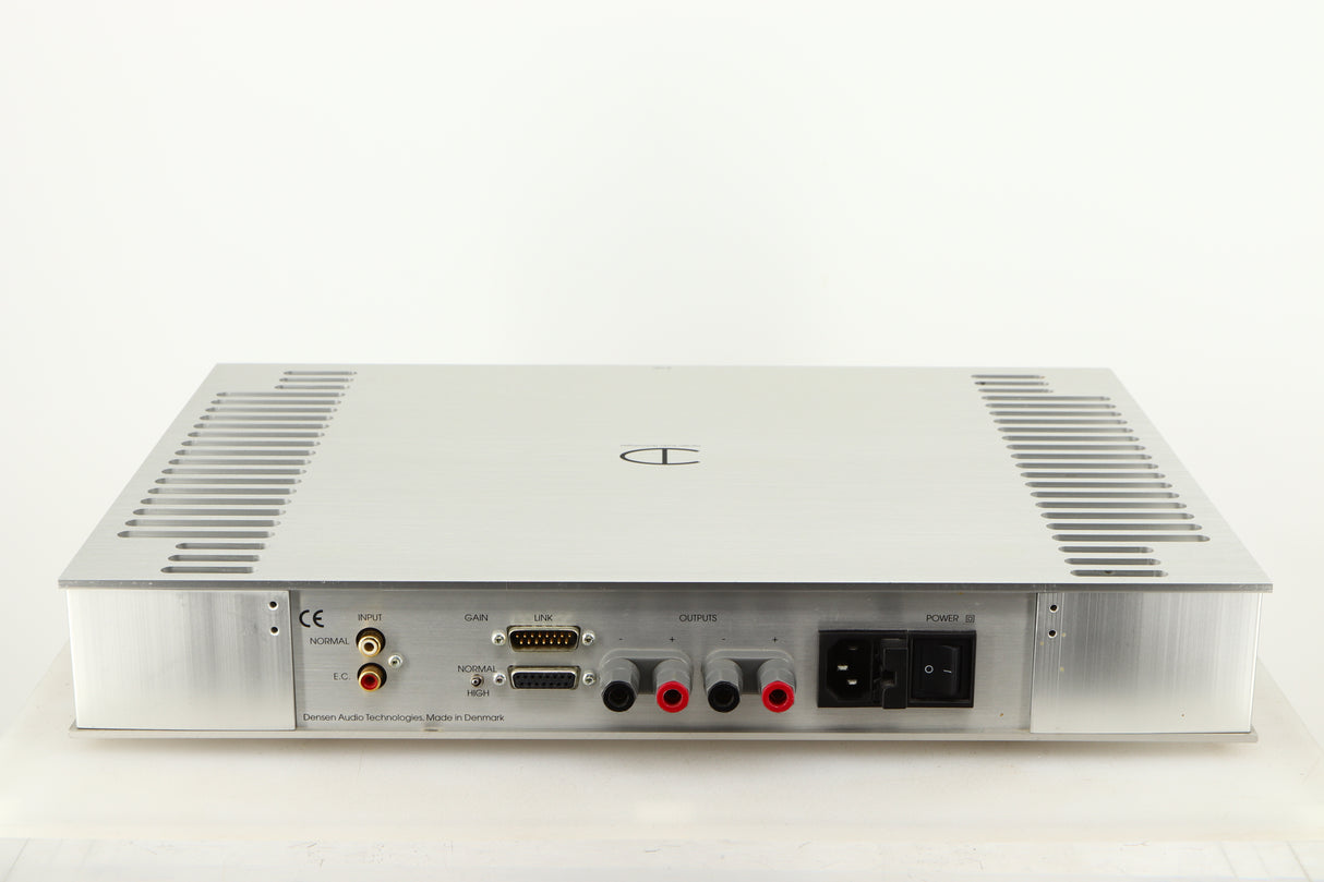 Rear view of a used Densen B350Plus Monoblock Power Amplifier in a silver finish showing Mains Input, Speaker Outputs and Phono Inputs