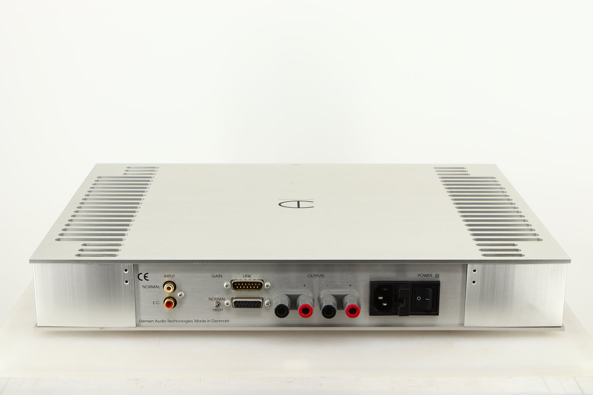 Rear view of a used Densen B350Plus Monoblock Power Amplifier in a silver finish showing Mains Input, Speaker Outputs and Phono Inputs