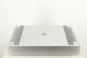 Top of a used Densen B350Plus Monoblock Power Amplifier in a silver finish