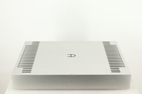 Top of a used Densen B350Plus Monoblock Power Amplifier in a silver finish
