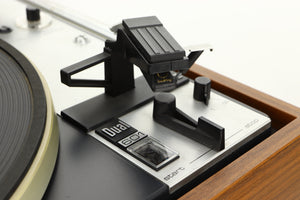 Close up of a used Dual 601 Turntable / Goldring 1042 Cartridge in a walnut finish showing cartridge