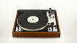 Front view of a used Dual 601 Turntable / Goldring 1042 Cartridge in a walnut finish 