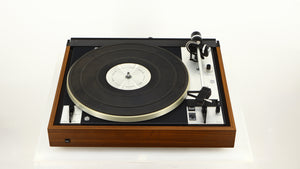Front view of a used Dual 601 Turntable / Goldring 1042 Cartridge in a walnut finish 