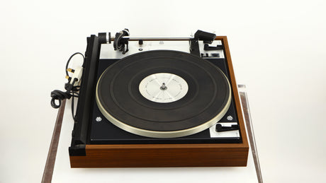 Left side view of a used Dual 601 Turntable / Goldring 1042 Cartridge in a walnut finish 
