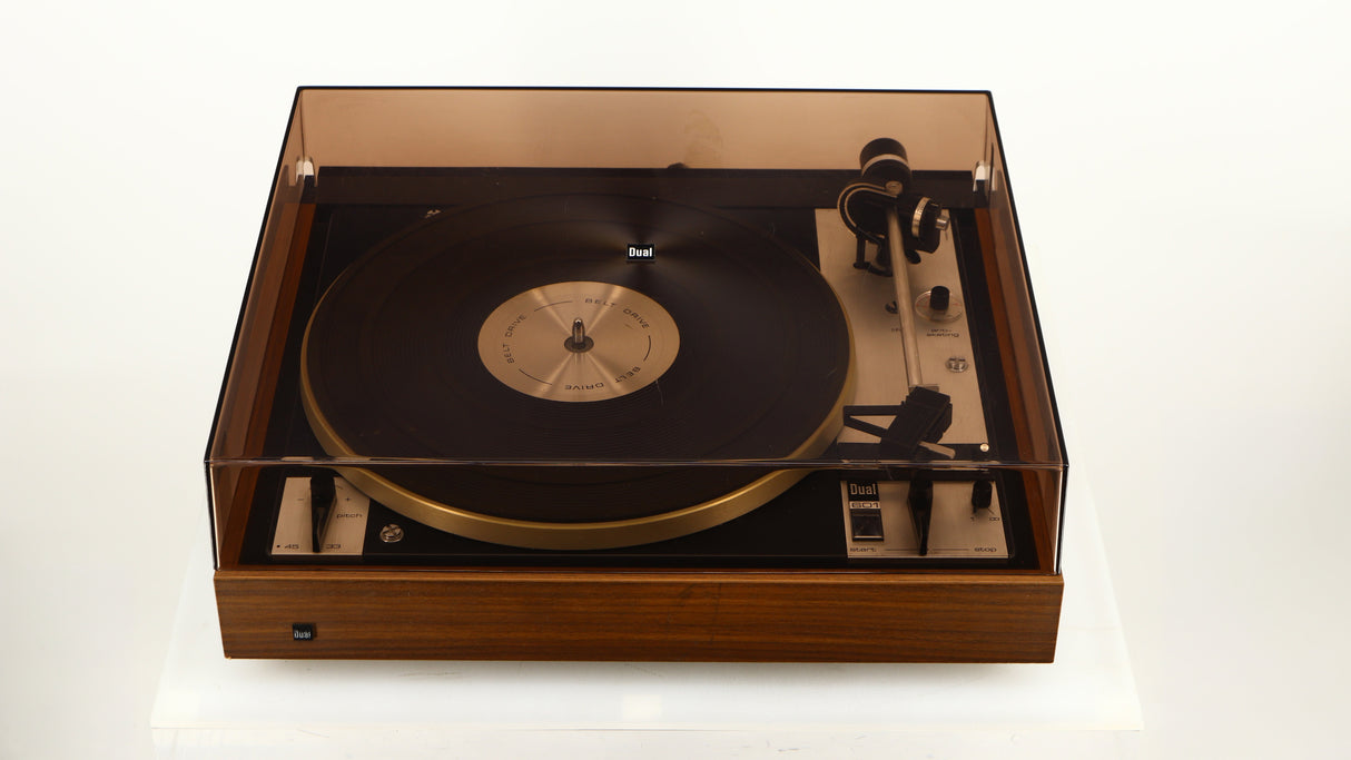 Top of a used Dual 601 Turntable / Goldring 1042 Cartridge in a walnut finish showing Lid