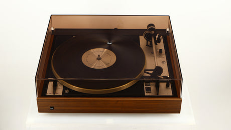 Top of a used Dual 601 Turntable / Goldring 1042 Cartridge in a walnut finish showing Lid