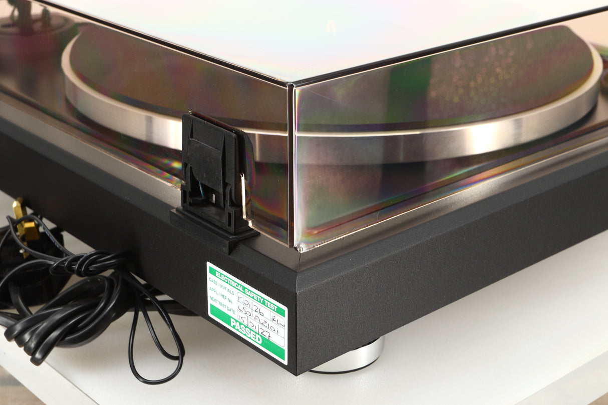 Rear left corner of a used Dual CS 505-4 Turntable in a black finish