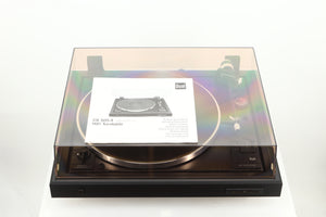 Top view of a used Dual CS 505-4 Turntable in a black finish showing the manual