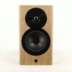 Front view of a used Dynaudio Focus 10 Standmount Speaker in a blonde finish