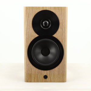 Front view of a used Dynaudio Focus 10 Standmount Speaker in a blonde finish