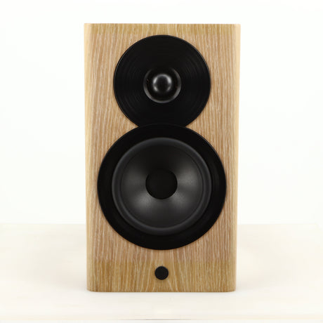 Front view of a used Dynaudio Focus 10 Standmount Speaker in a blonde finish