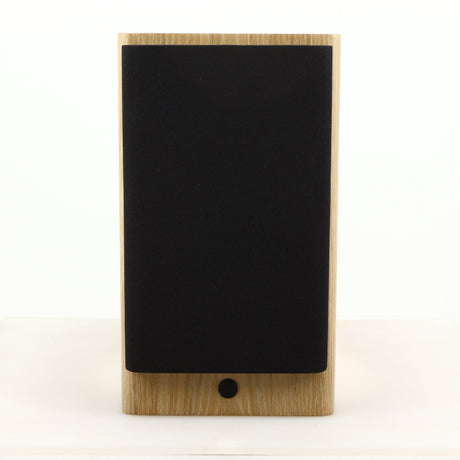 Front view of a used Dynaudio Focus 10 Standmount Speaker in a blonde finish showing Grille