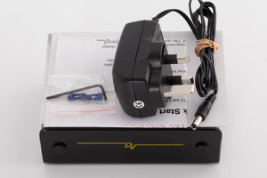 Top of a used Dynavector P75 MK3 Phonostage showing Manual, PSU and Allen Key