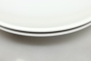 Close up view of a used Edwards Audio Apprentice Turntable in White finish showing some small dents on the side