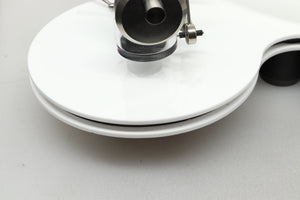 Close up view of a used Edwards Audio Apprentice Turntable in White finish showing some small dents on the side