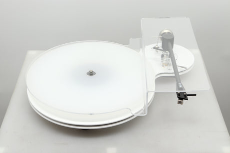 Top view of a used Edwards Audio Apprentice Turntable in White finish with the dustover