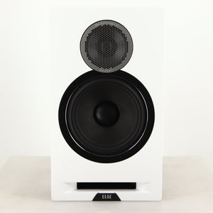 Front view of a used ELAC DBR62 Standmount Speaker in a light oak finish