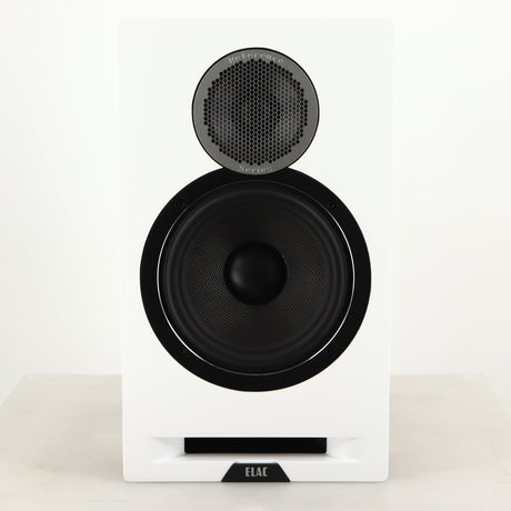 Front view of a used ELAC DBR62 Standmount Speaker in a light oak finish
