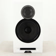 Front view of a used ELAC DBR62 Standmount Speaker in a light oak finish