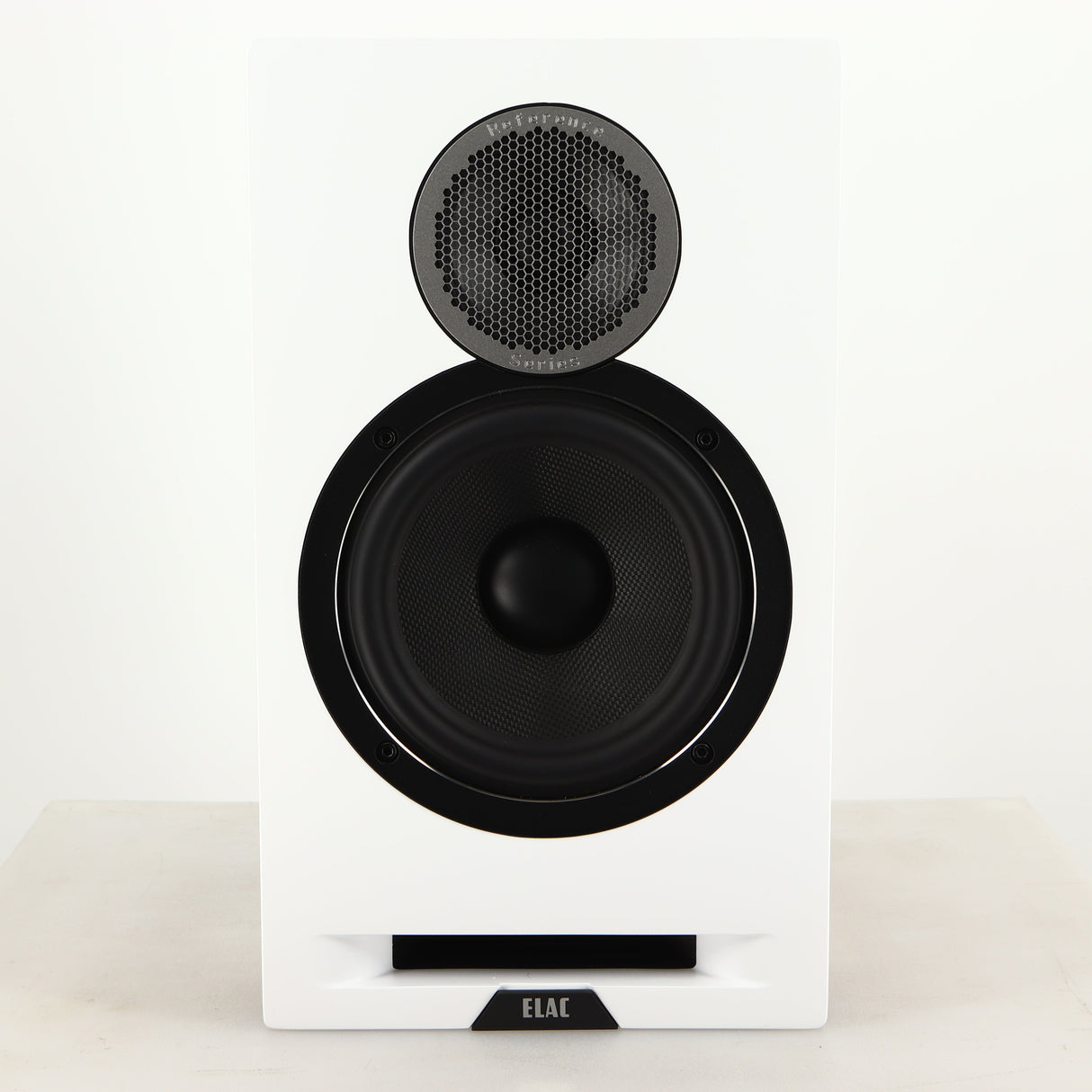 Front view of a used ELAC DBR62 Standmount Speaker in a light oak finish
