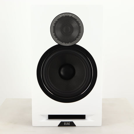 Front view of a used ELAC DBR62 Standmount Speaker in a light oak finish