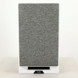 Front view of a used ELAC DBR62 Standmount Speaker in a light oak finish showing grille