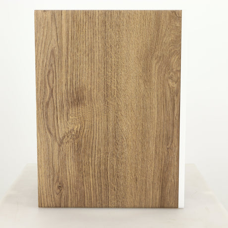 Left side view of a used ELAC DBR62 Standmount Speaker in a light oak finish
