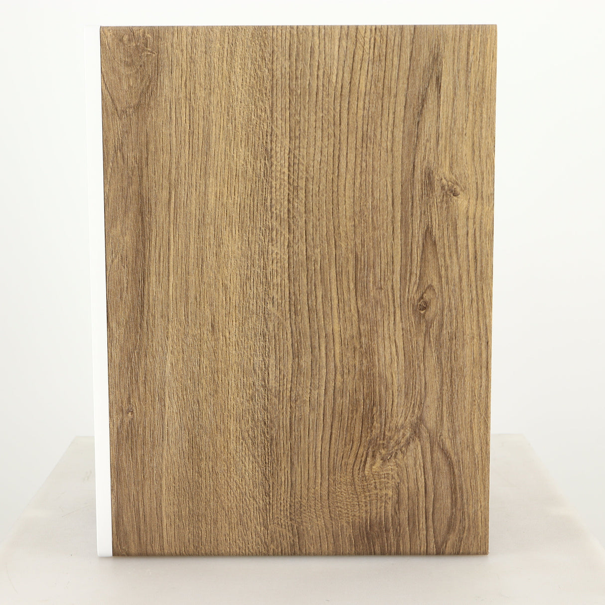 Right side view of a used ELAC DBR62 Standmount Speaker in a light oak finish