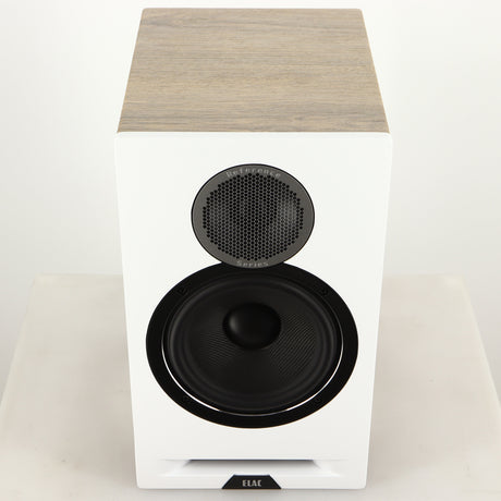 Top of a used ELAC DBR62 Standmount Speaker in a light oak finish