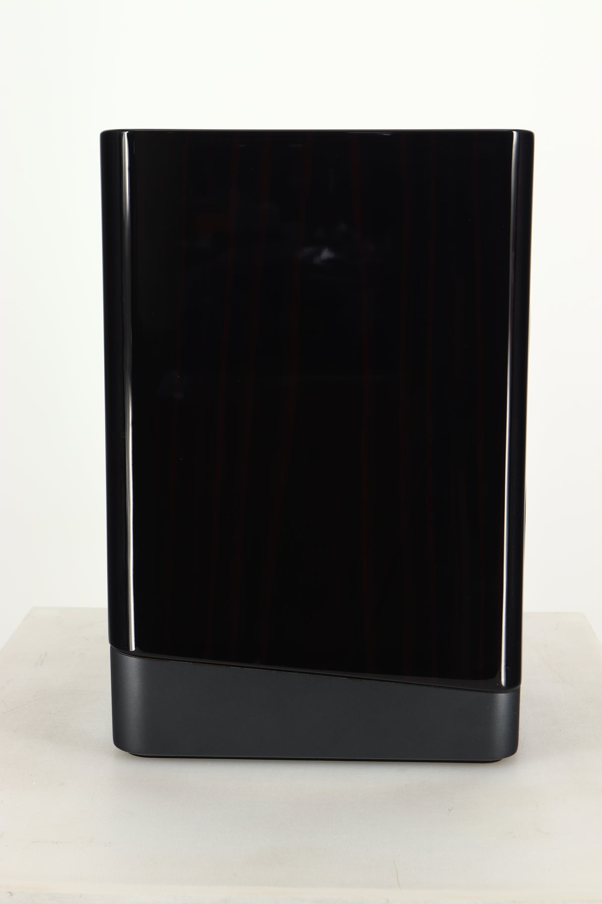 Side view of a used ELAC Navis B51 Active Standmount Speaker in Gloss Ebony Emara finish
