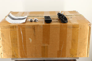 Box of a used Electrocompaniet ECI-3 Integrated Amplifier with mains cable, manual, remote, and 2x XLR-RCA Adaptors