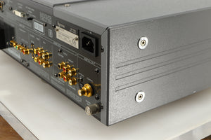 Rear left corner of a used Esoteric DV-50s DVD Player in a silver finish